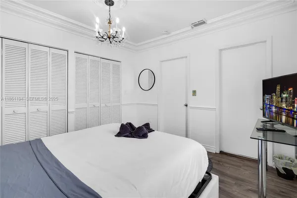 a bathroom with a toilet a sink and a window