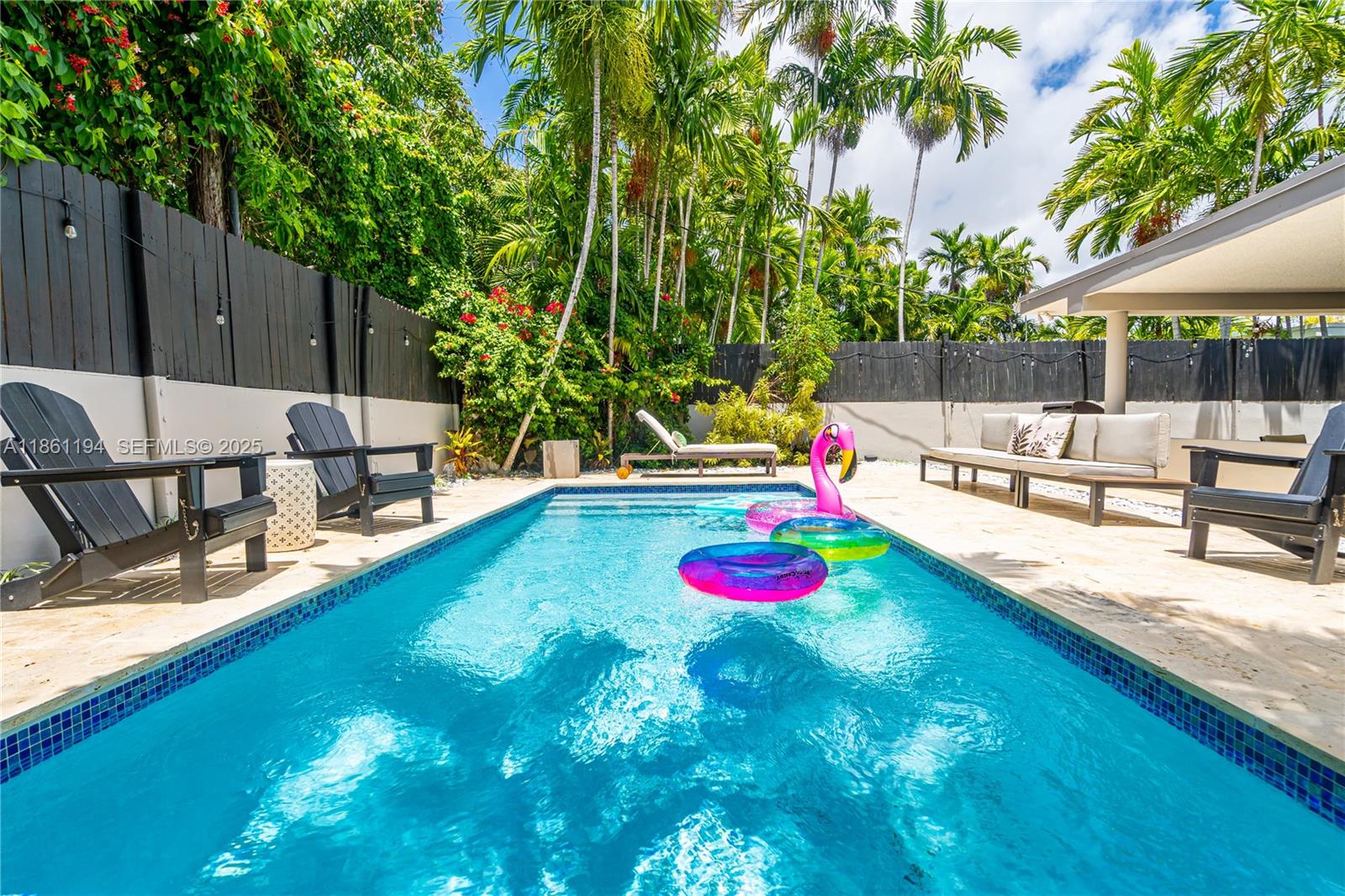 520 Southwest 22nd Road Miami, FL 33129 - Photo 5 of 71 a view of a backyard with swimming pool