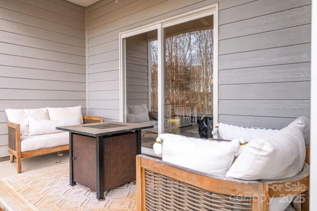 a living room with a couch and a table
