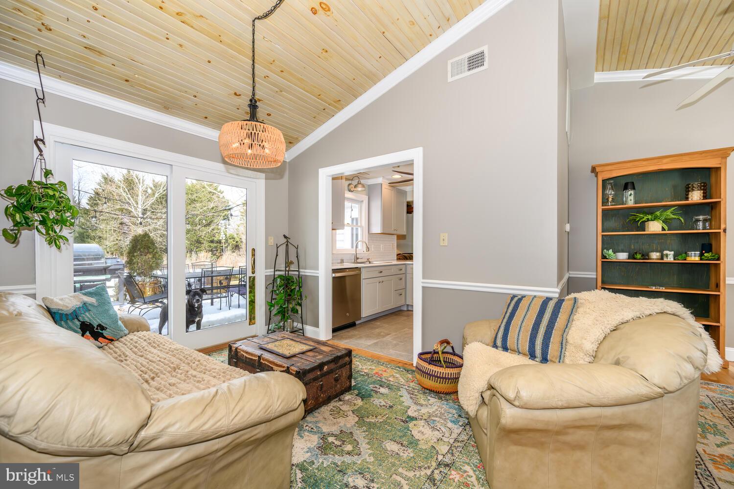 25706 Edgeview Road Royal Oak, MD 21662 - Photo 18 of 31 a living room with furniture and a large window