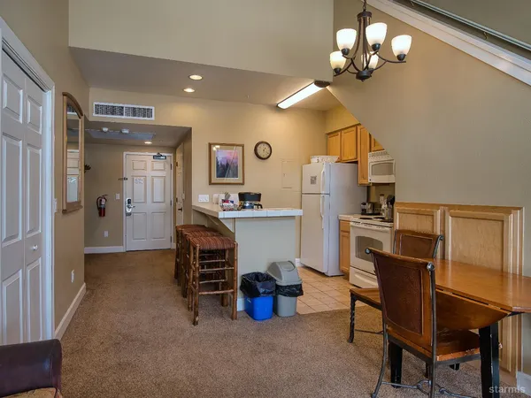 wooden floor with white walls