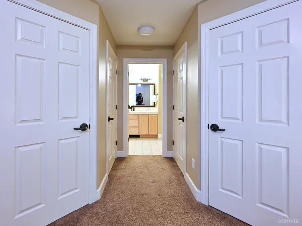 a bedroom with a bed and a cabinets