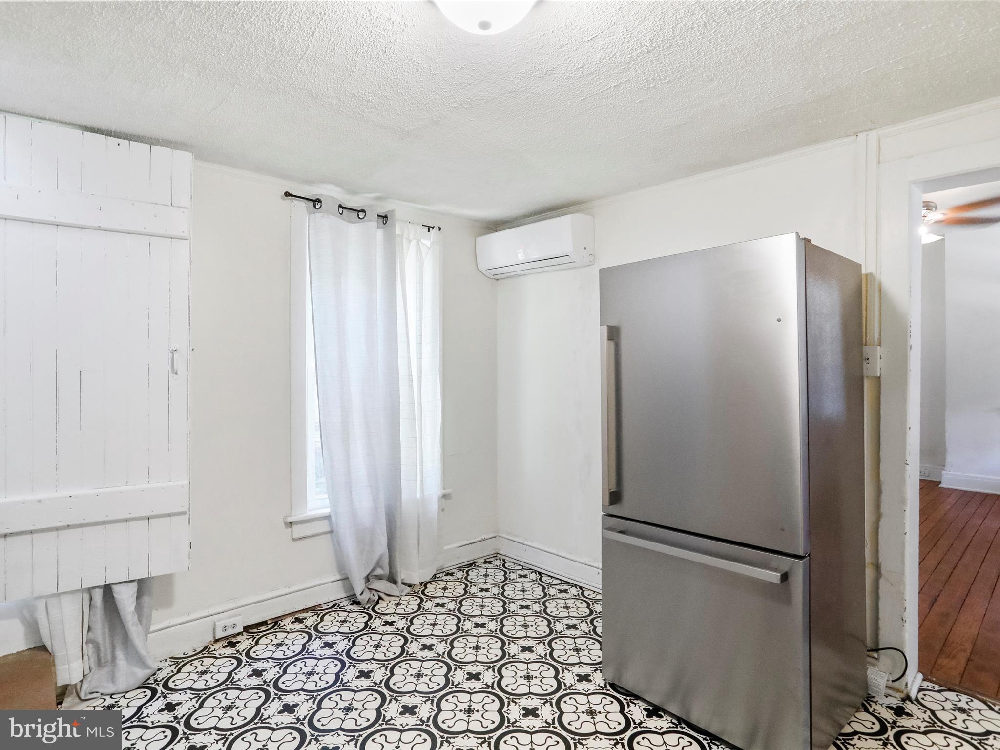 409 South Raleigh Street Martinsburg, WV 25401 - Photo 12 of 28 a bathroom with a bathtub and a shower