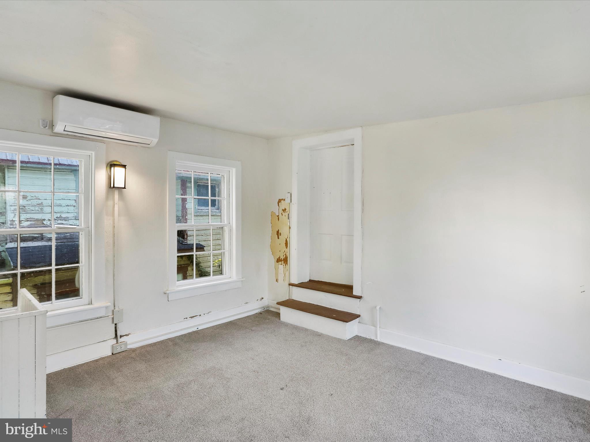 409 South Raleigh Street Martinsburg, WV 25401 - Photo 17 of 28 an empty room with windows