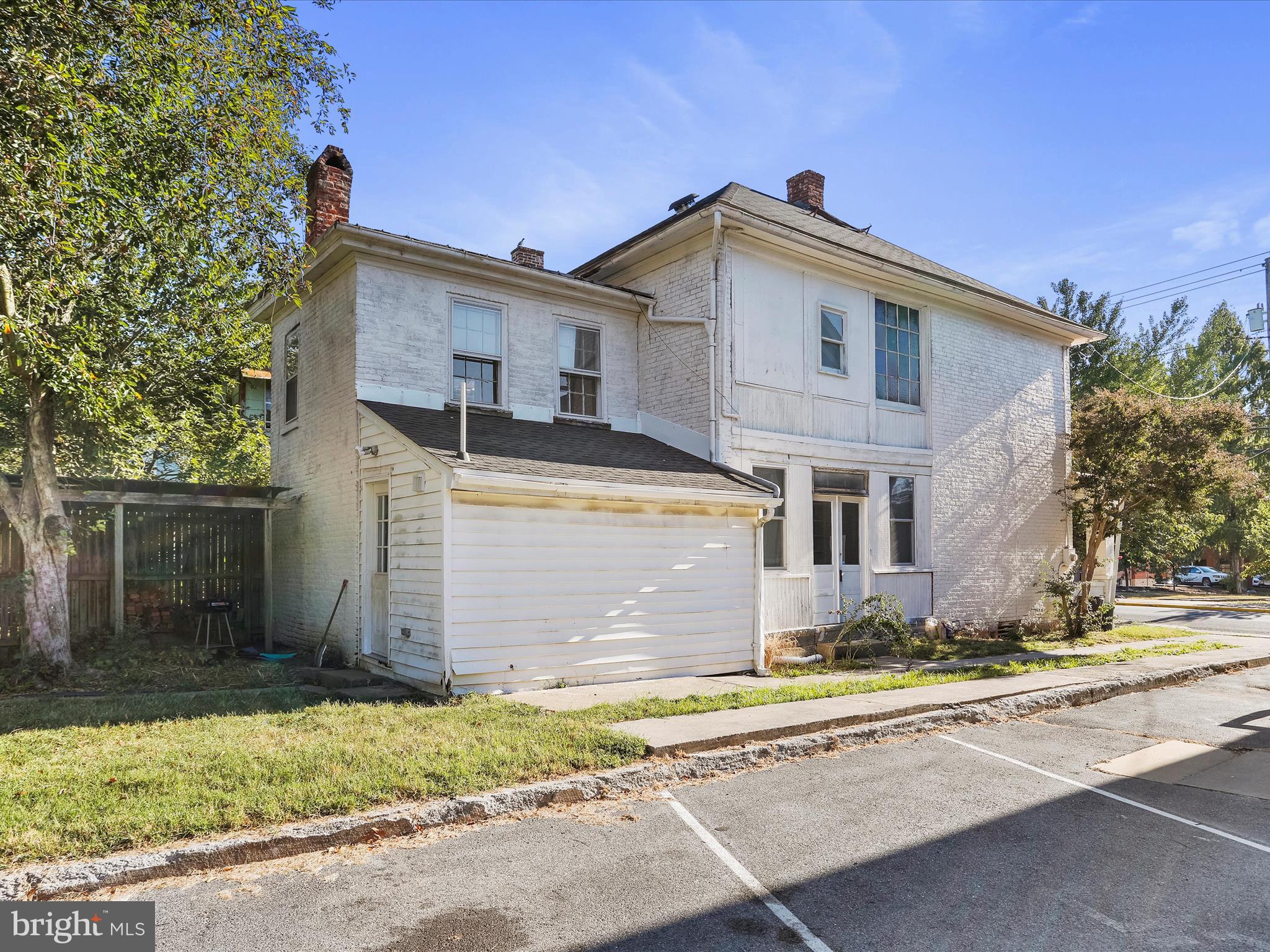 409 South Raleigh Street Martinsburg, WV 25401 - Photo 28 of 28 a front view of a house with a yard and garage