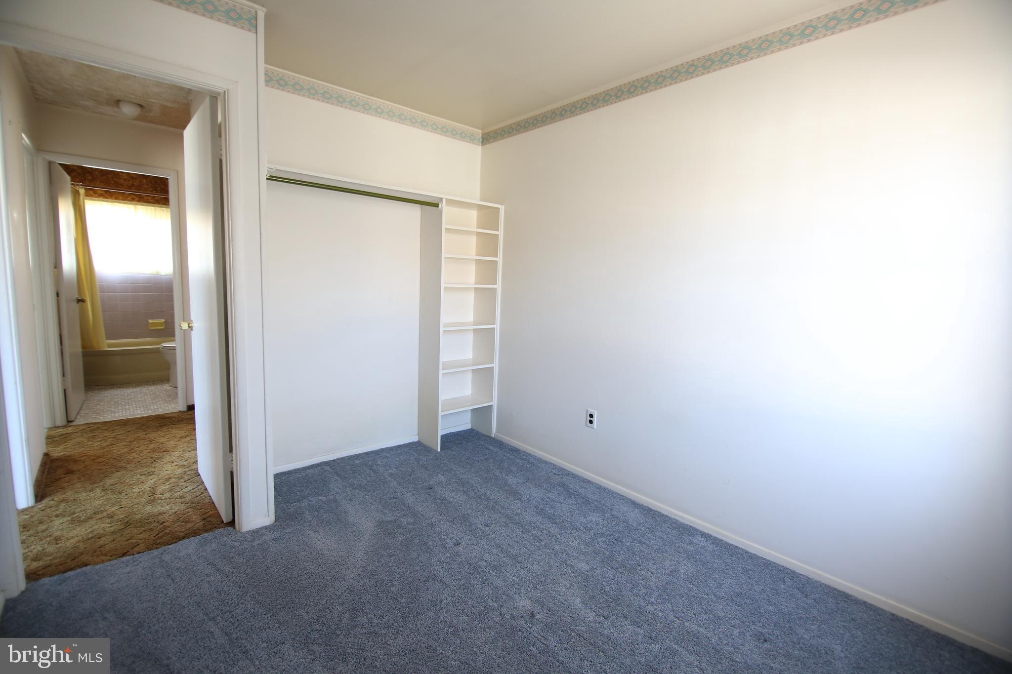 126 Gable Hill Road Levittown, PA 19057 - Photo 12 of 16 an empty room with closet and a bathroom