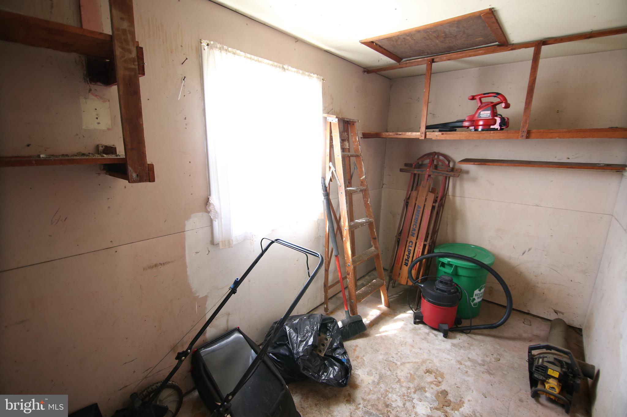 126 Gable Hill Road Levittown, PA 19057 - Photo 13 of 16 a view of a room with gym equipment