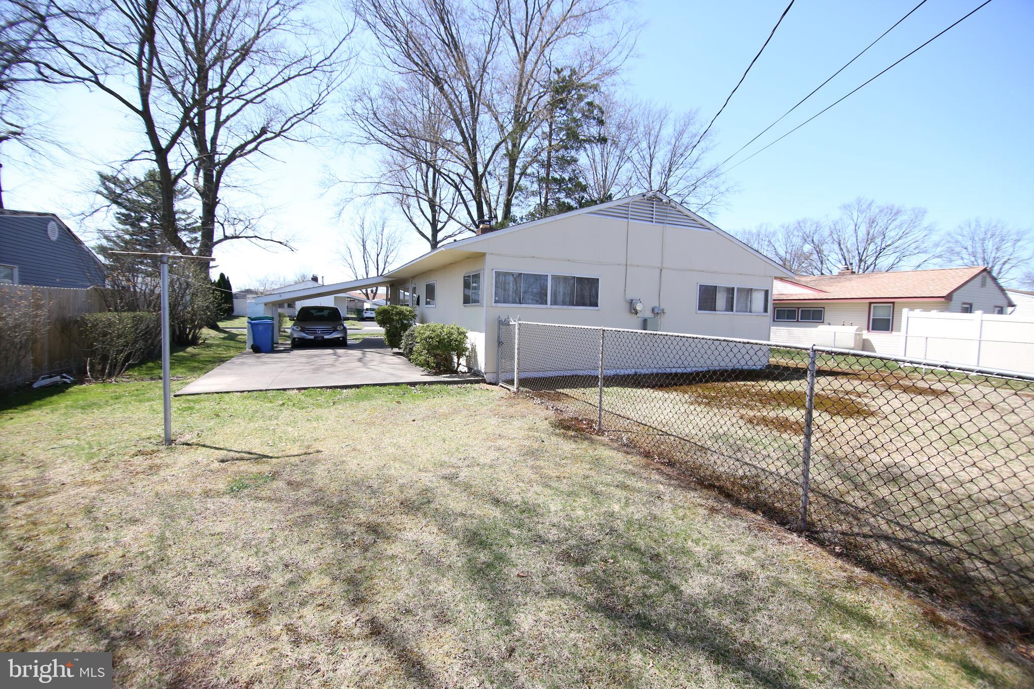 126 Gable Hill Road Levittown, PA 19057 - Photo 15 of 16 a house that has a tree in front of it