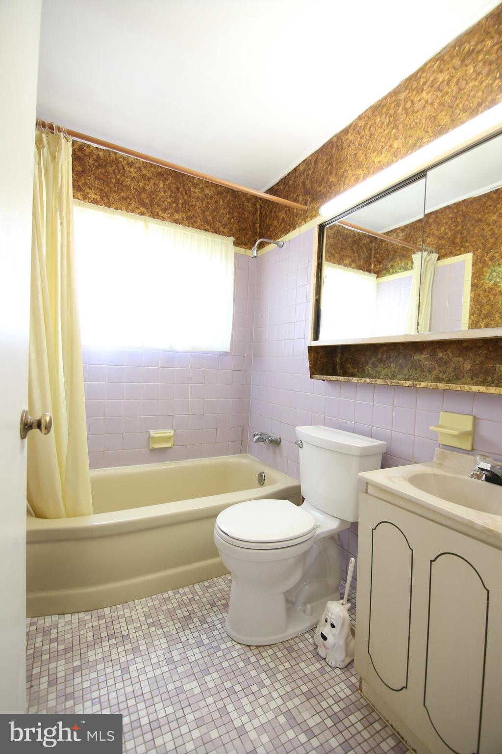 126 Gable Hill Road Levittown, PA 19057 - Photo 7 of 16 a bathroom with a sink toilet and shower