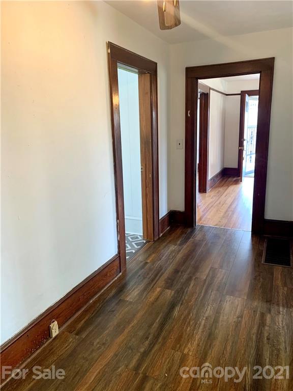 559 Thompson Cove Road Clyde, NC 28721 - Photo 16 of 36 a view of hallway with wooden floor