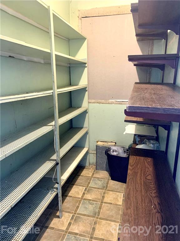 559 Thompson Cove Road Clyde, NC 28721 - Photo 23 of 36 a room with storage and utility