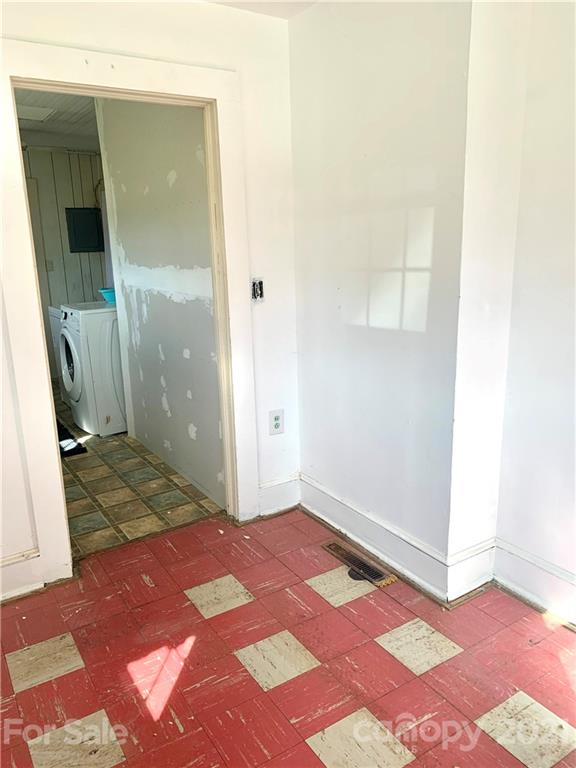 559 Thompson Cove Road Clyde, NC 28721 - Photo 29 of 36 an empty room with an entryway