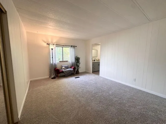 a view of a room with a window