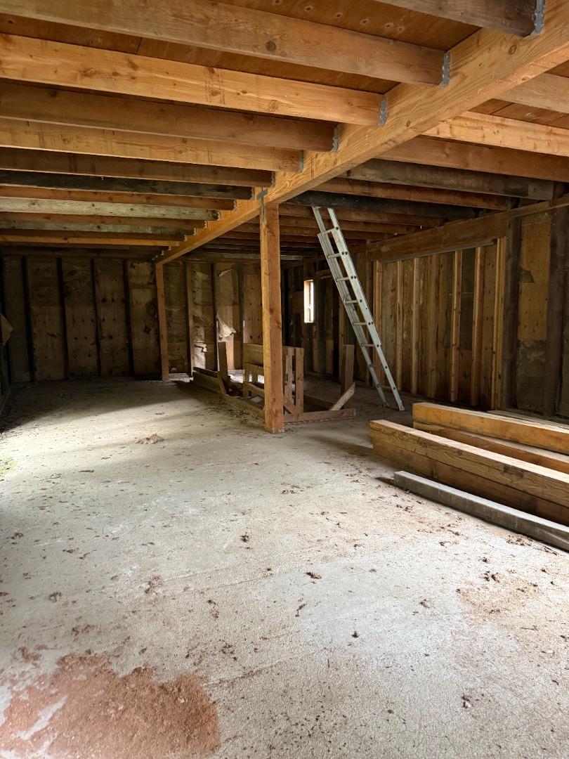 14715 Uvas Road Morgan Hill, CA 95037 - Photo 5 of 11 a view of a room with wooden walls