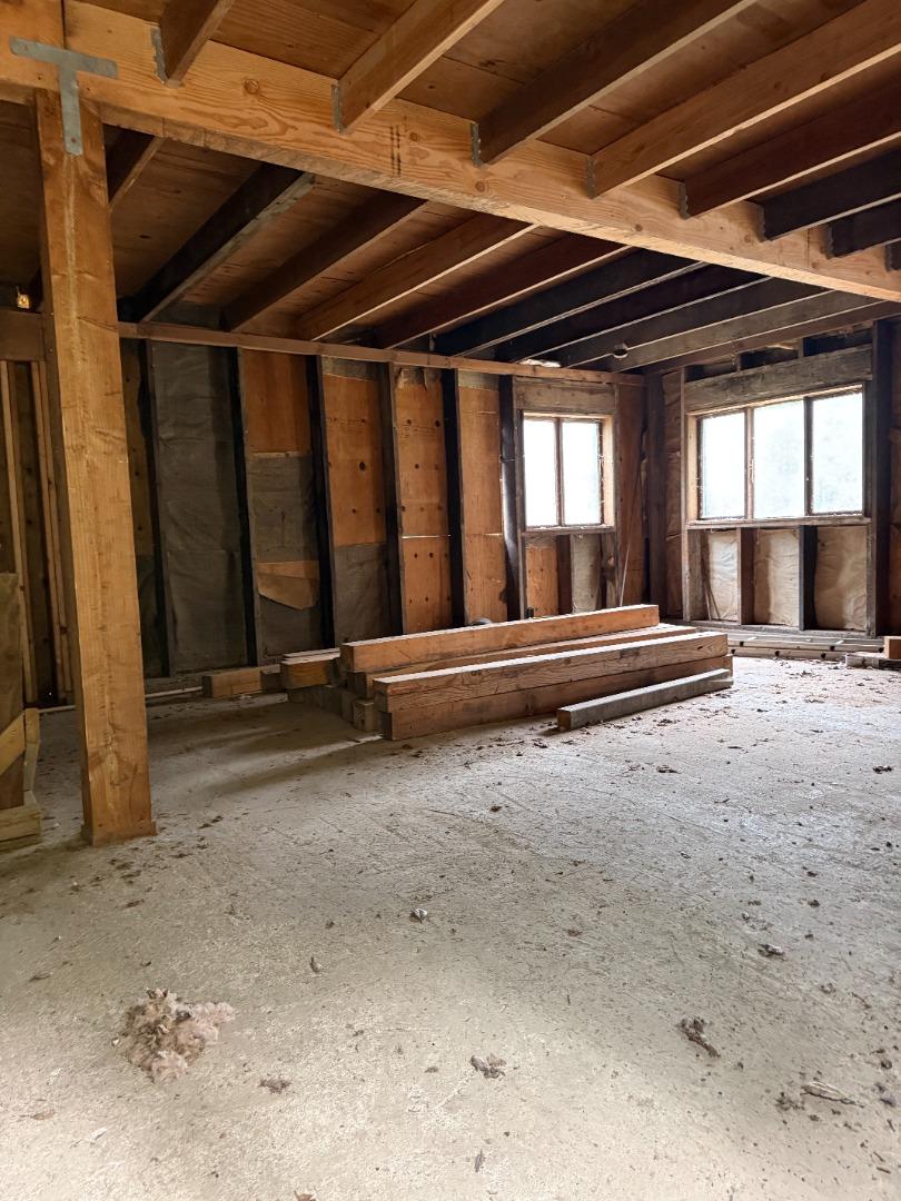 14715 Uvas Road Morgan Hill, CA 95037 - Photo 6 of 11 a view of a room with wooden walls