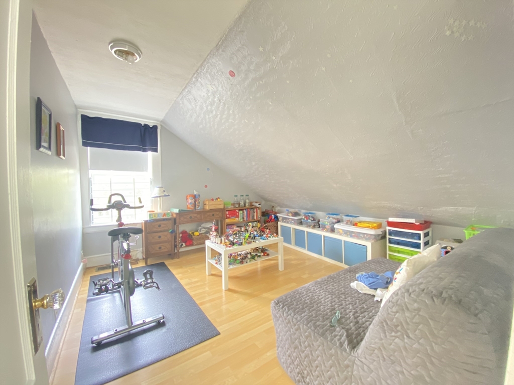 1 Minton Street, Unit 2 Boston, MA 02130 - Photo 11 of 12 a living room with furniture and a table