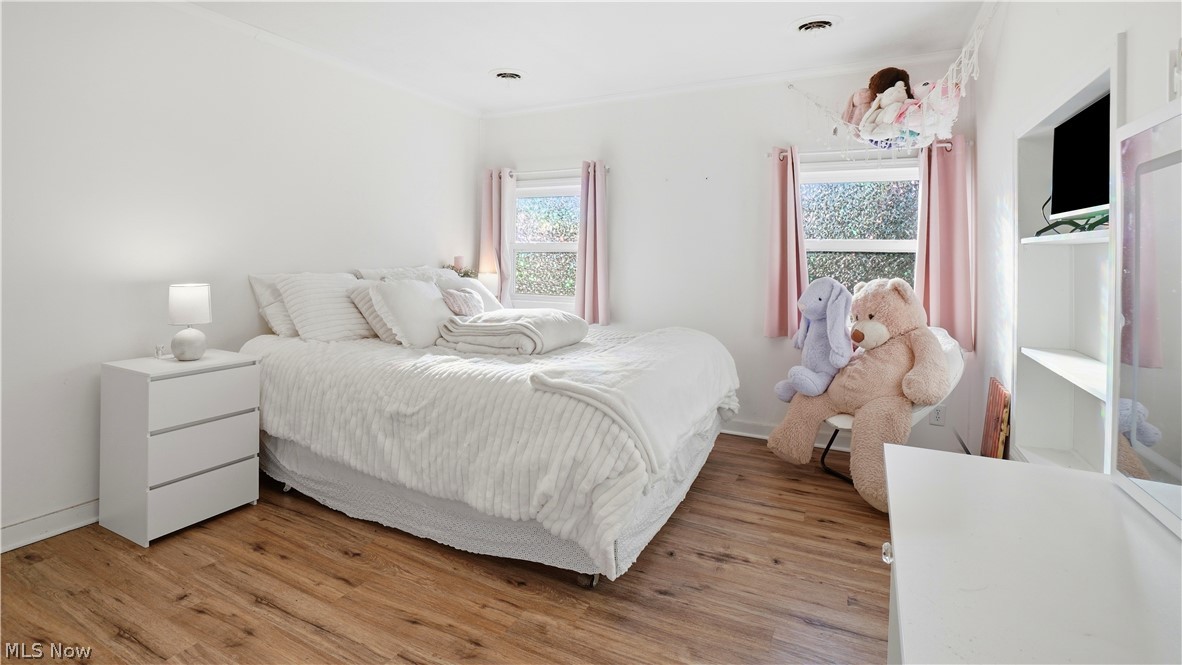 65892 Endley Road Cambridge, OH 43725 - Photo 25 of 50 Bedroom featuring light wood-style flooring
