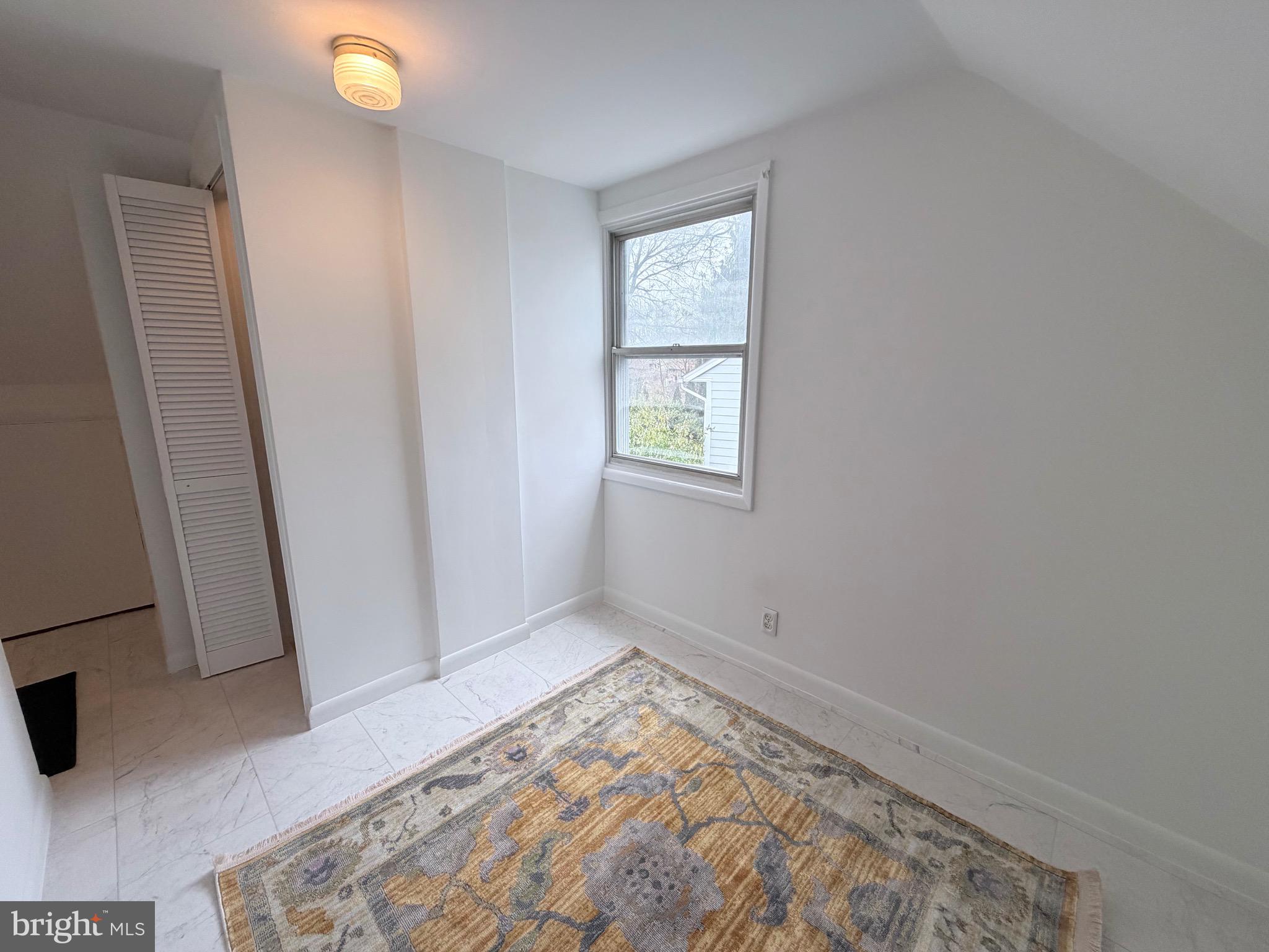 2207 Luzerne Avenue Silver Spring, MD 20910 - Photo 26 of 39 an empty room with windows