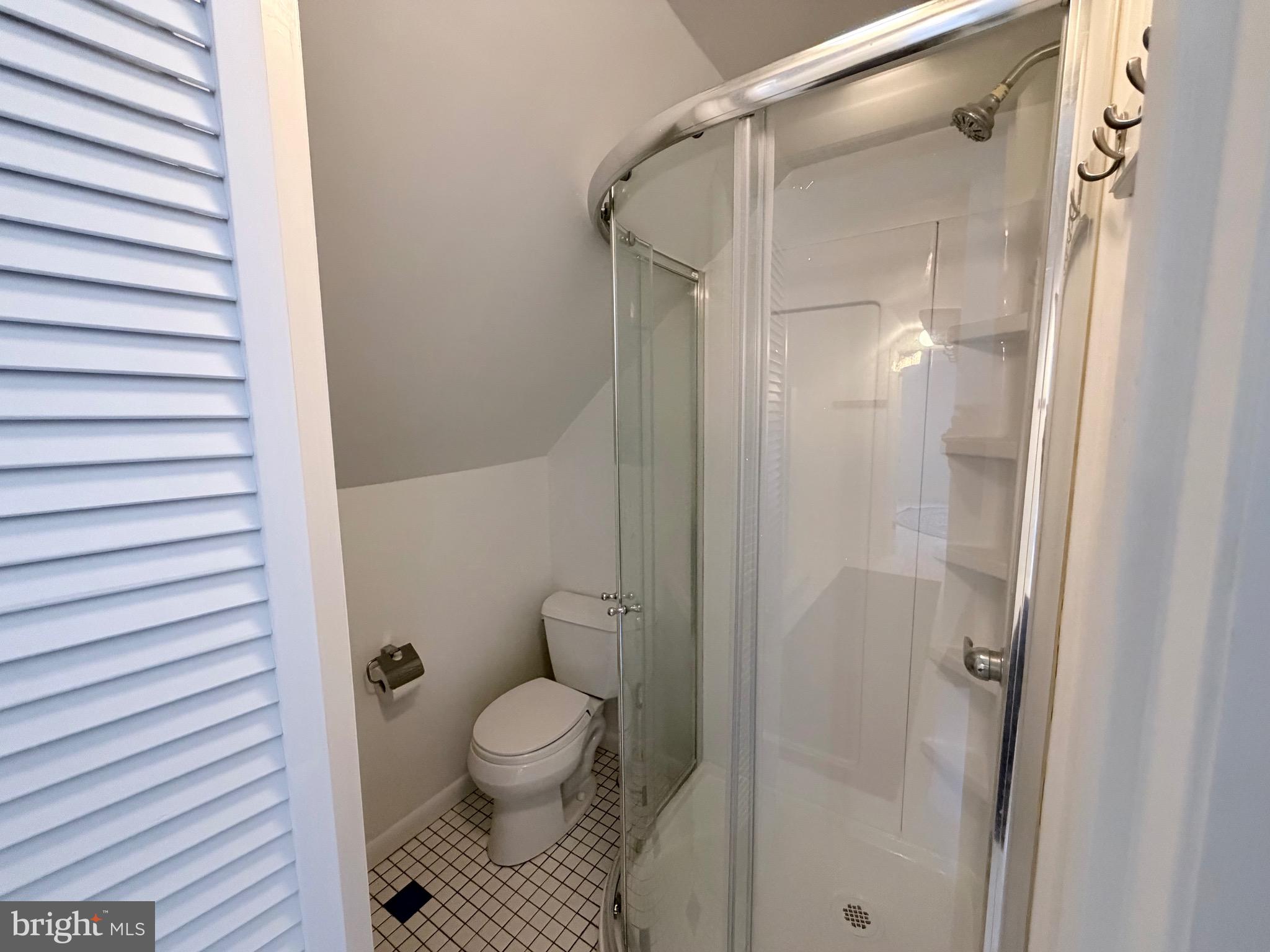 2207 Luzerne Avenue Silver Spring, MD 20910 - Photo 27 of 39 a bathroom with a shower and a toilet