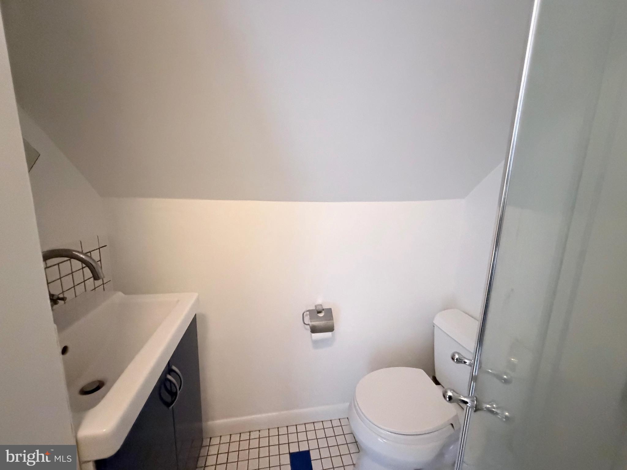 2207 Luzerne Avenue Silver Spring, MD 20910 - Photo 28 of 39 a bathroom with a sink and a toilet