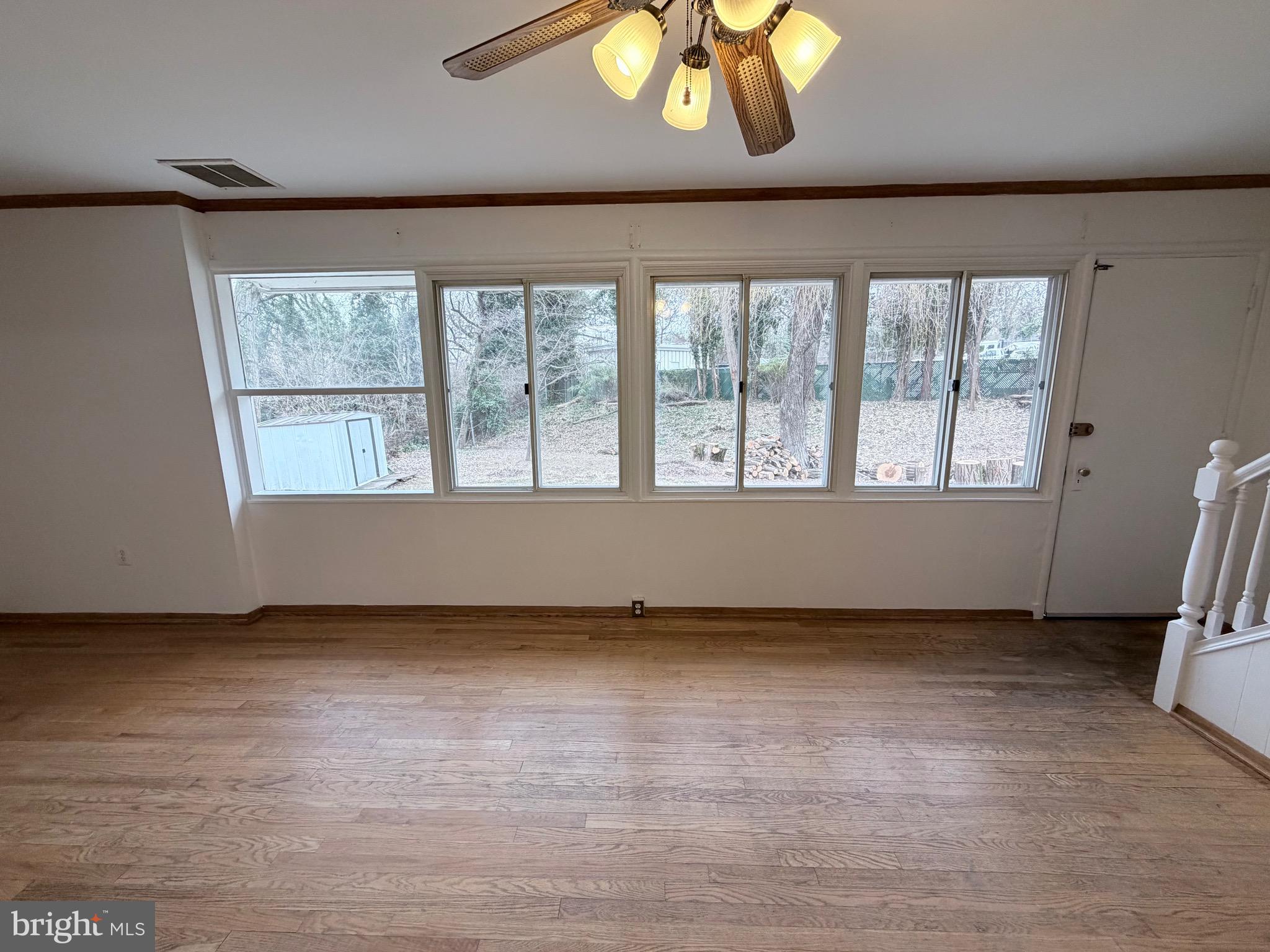 2207 Luzerne Avenue Silver Spring, MD 20910 - Photo 5 of 39 wooden floor in an empty room with a window