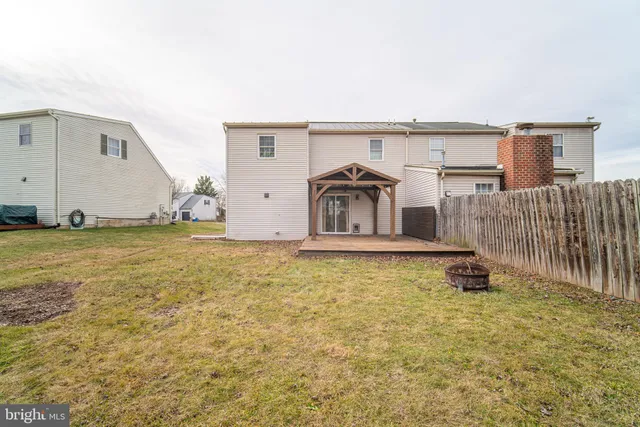 a view of a house with a balcony and garage