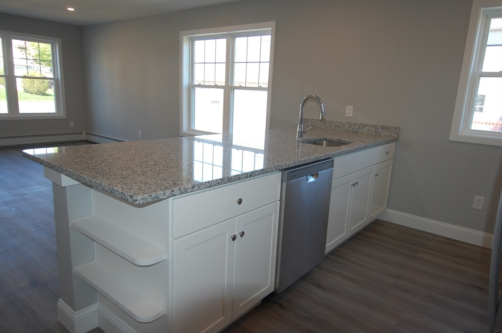 9 Bolton Road, Unit S Dartmouth, MA 02748 - Photo 6 of 19 a kitchen with granite countertop a sink and a window