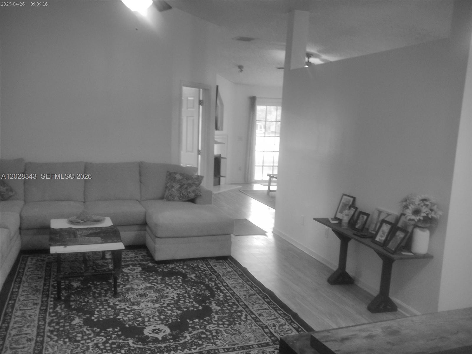 1641 Spring Oaks Lane Jacksonville, FL 32221 - Photo 4 of 44 a living room with furniture and wooden floor