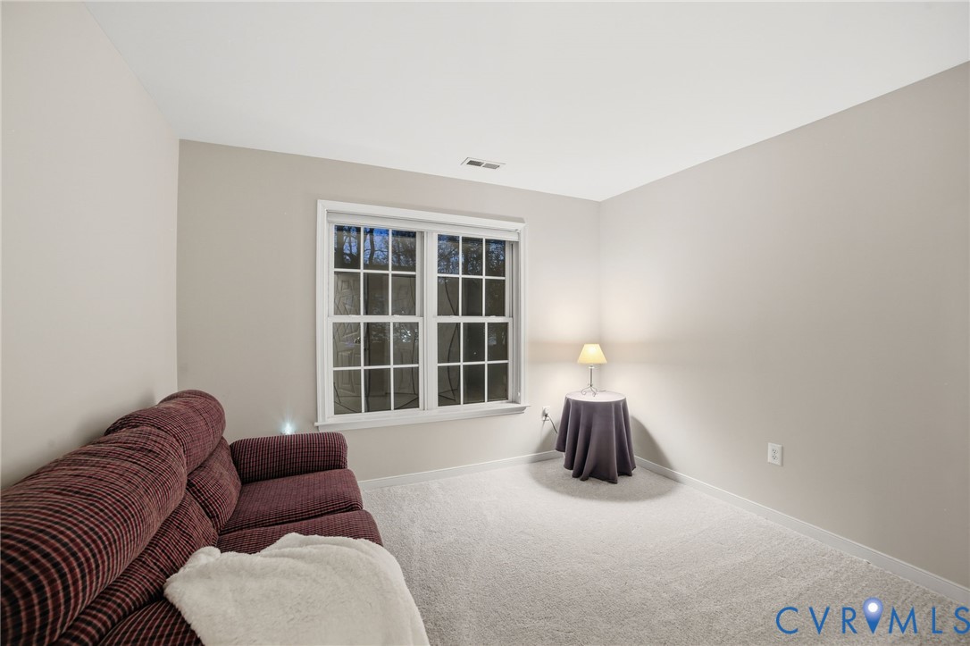 11801 Alder Ridge Place Glen Allen, VA 23059 - Photo 19 of 31 a living room with furniture and a window