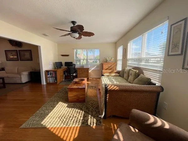 a living room with furniture or couch and a window