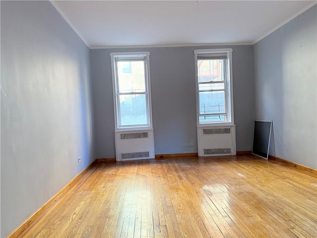 1900 Quentin Road, Unit A15 Brooklyn, NY 11229 - Photo 7 of 8 an empty room with a window
