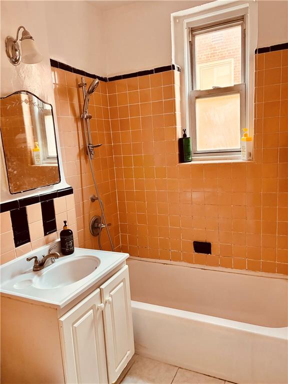 1900 Quentin Road, Unit A15 Brooklyn, NY 11229 - Photo 8 of 8 a bathroom with a sink and a bathtub