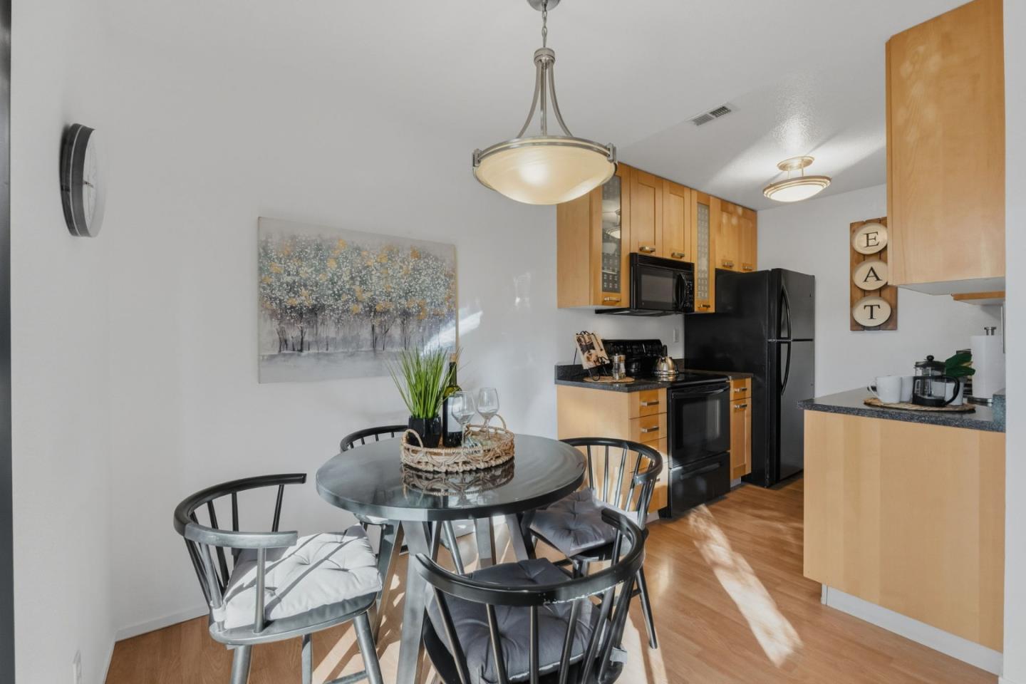 2106 La Terrace Circle San Jose, CA 95123 - Photo 11 of 31 a view of a dining room with furniture and wooden floor
