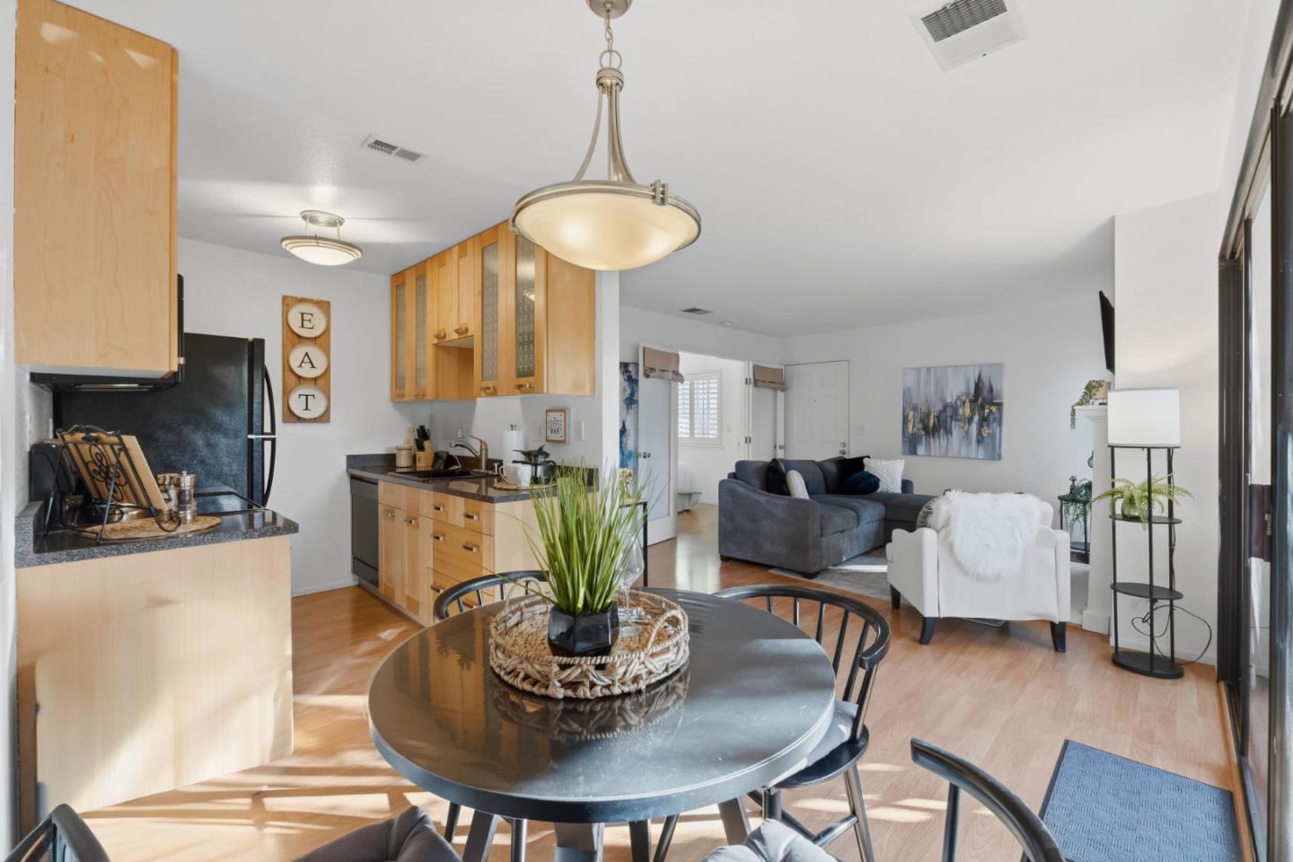 2106 La Terrace Circle San Jose, CA 95123 - Photo 13 of 31 a dining room with furniture and wooden floor