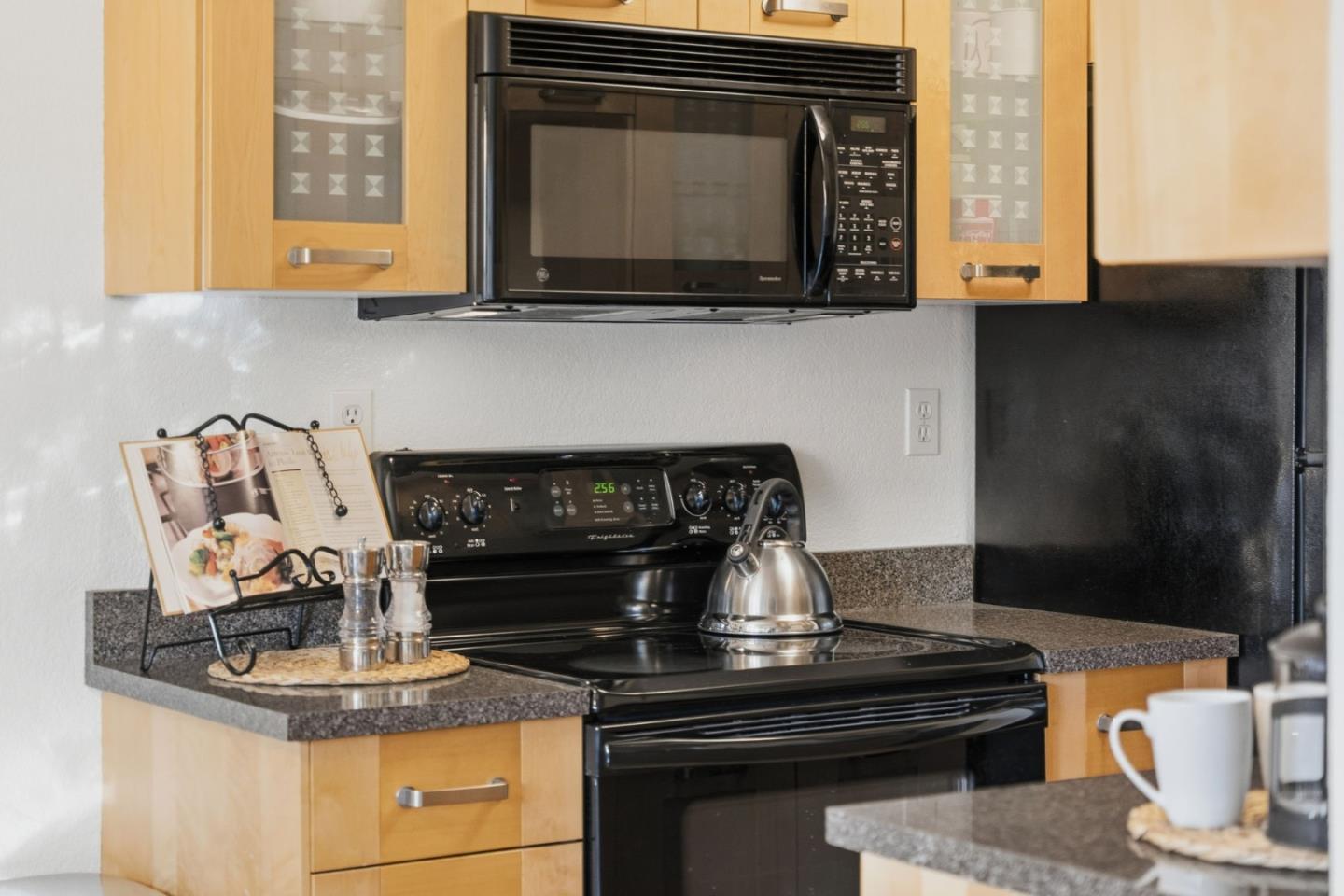 2106 La Terrace Circle San Jose, CA 95123 - Photo 15 of 31 a stove top oven sitting inside of a kitchen