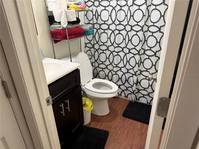 a bathroom with a toilet and a sink