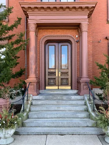 a car parked in front of a house