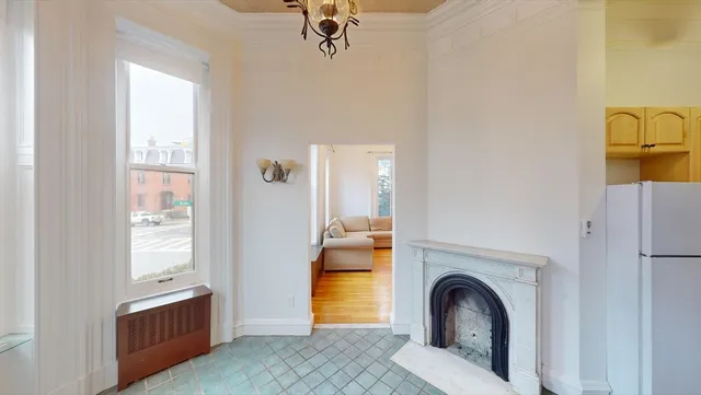 a en suite bathroom with a sink a washer and dryer