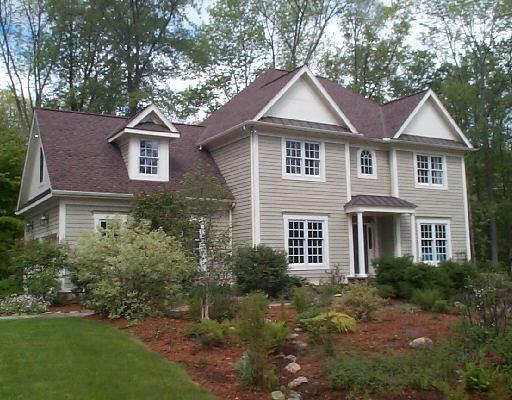 14 Windy Hill Road Redding, CT 06896 - Photo 1 of 1 a front view of a house with a yard