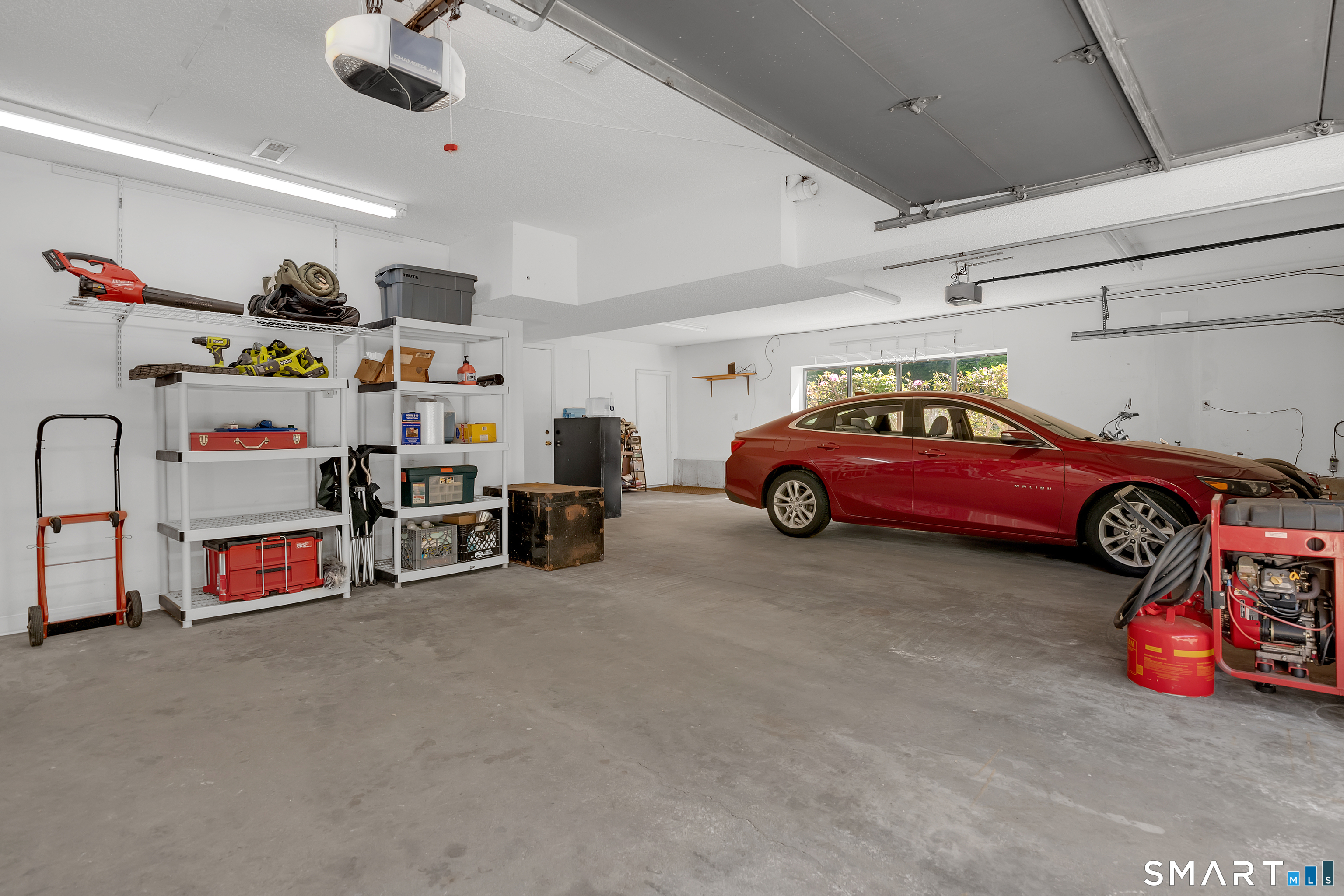 90 Bell Street Manchester, CT 06040 - Photo 30 of 40 a car is parked in a garage