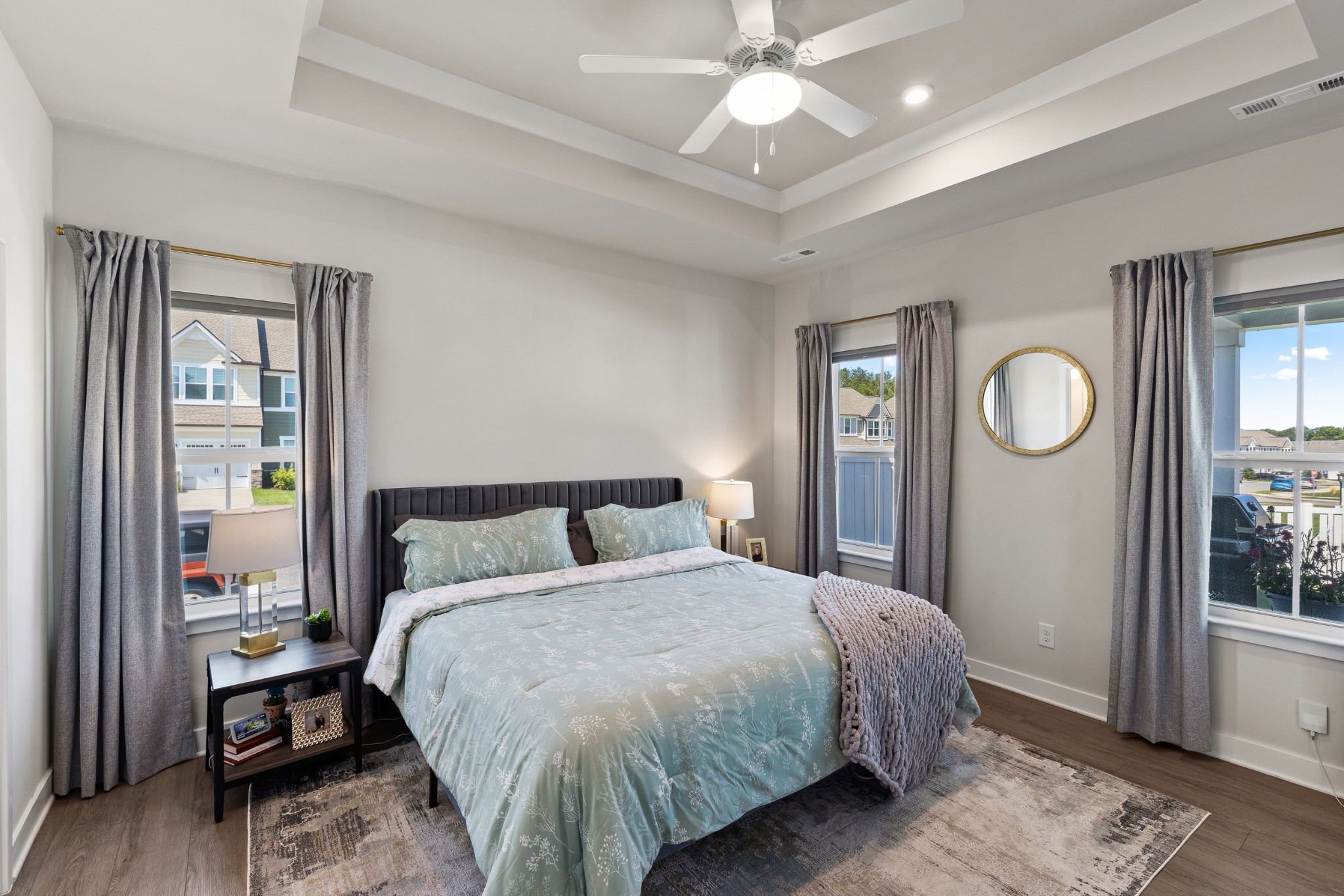 203 Pitchfork Way Gallatin, TN 37066 - Photo 22 of 39 a bedroom with a large bed and a chandelier