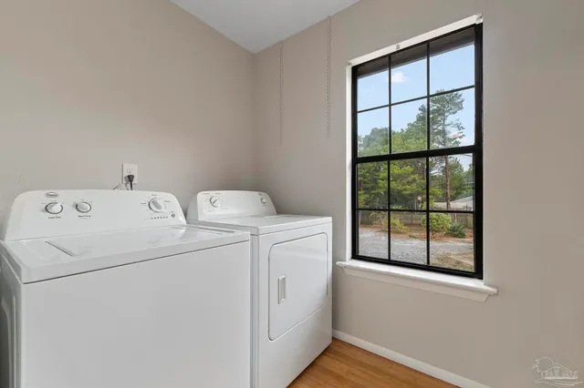 a utility room with dryer and washer