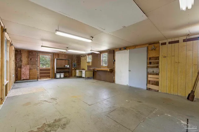 a view of livingroom with walk in closet and window