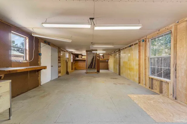 a view of a hallway with stairs