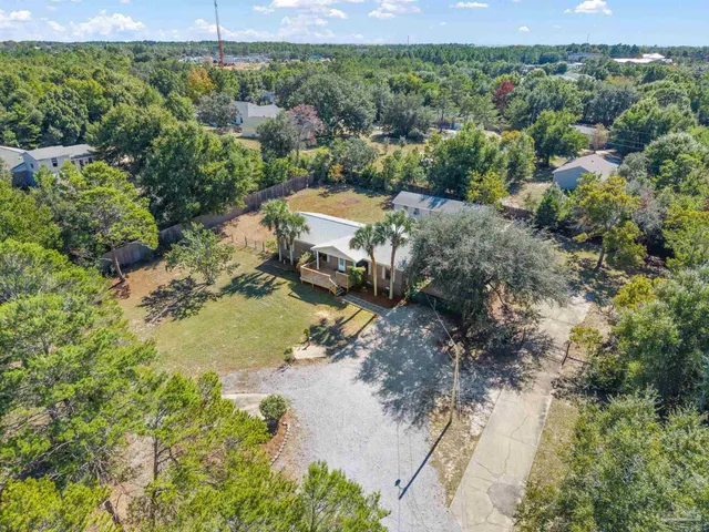 a view of a lake with green space