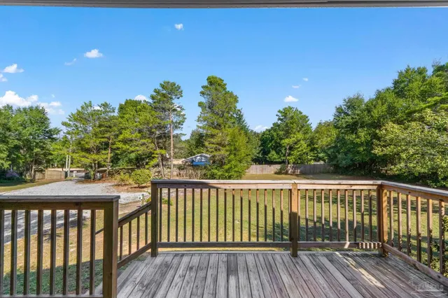 a view of a wooden roof deck