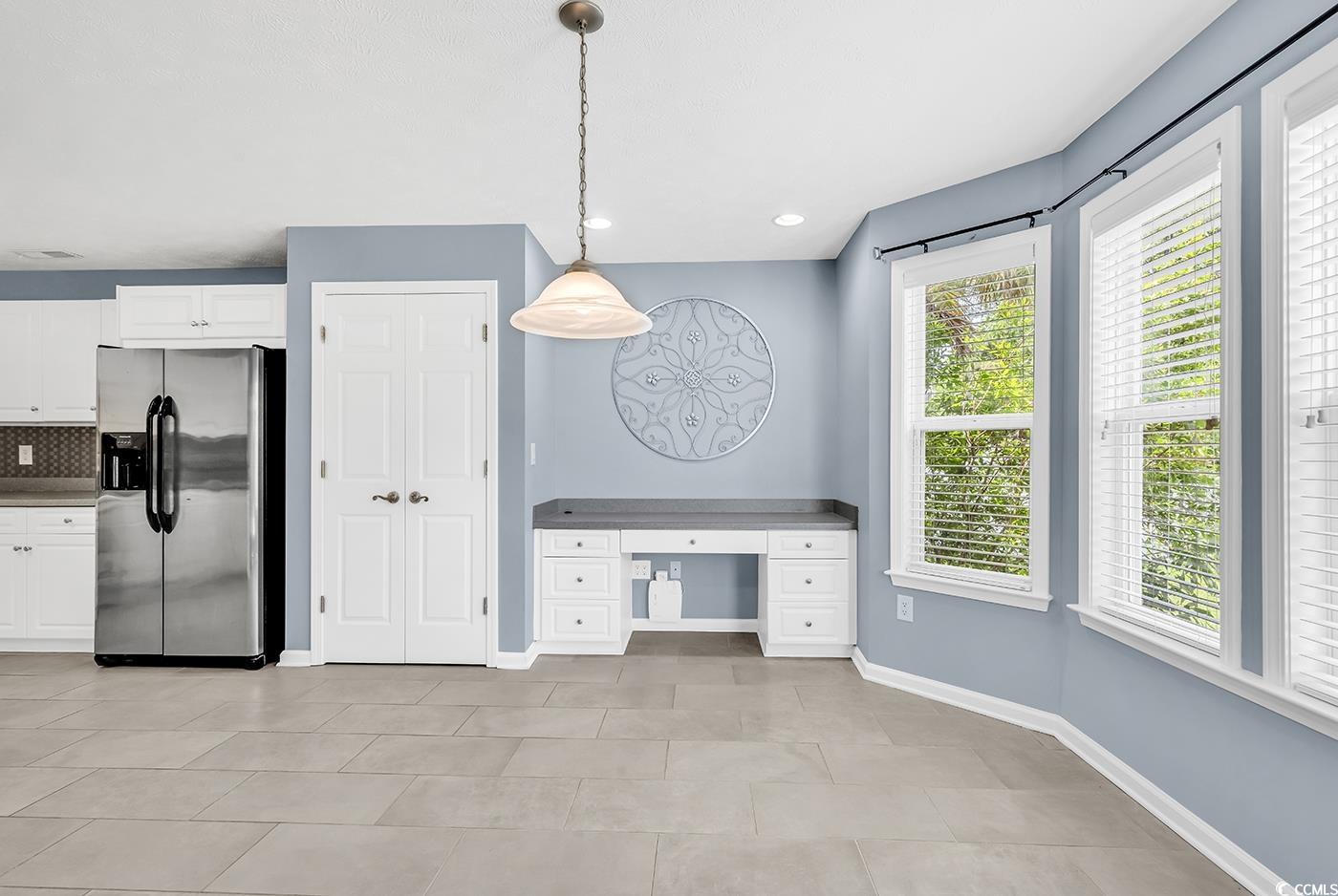 389 Barton Loop Myrtle Beach, SC 29579 - Photo 17 of 40 Interior space with visible vents, built in desk,