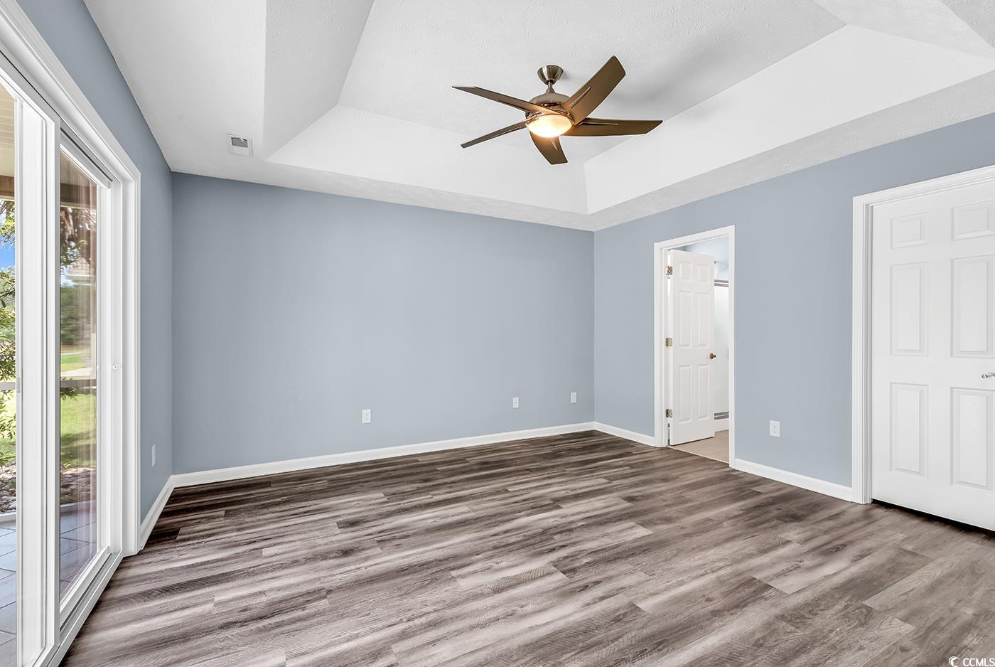 389 Barton Loop Myrtle Beach, SC 29579 - Photo 25 of 40 Unfurnished bedroom with a raised ceiling, access