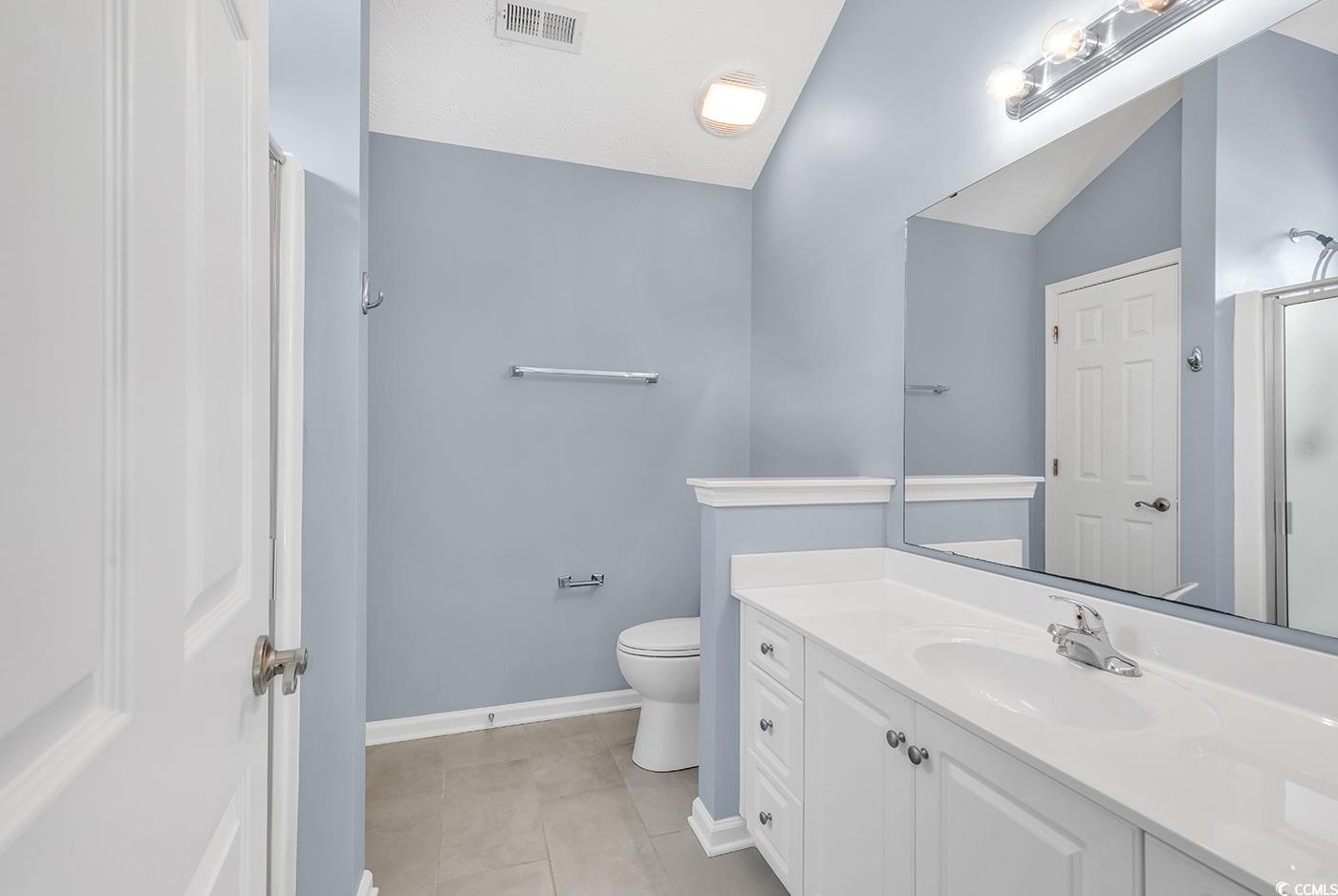 389 Barton Loop Myrtle Beach, SC 29579 - Photo 27 of 40 Bathroom featuring visible vents, vaulted ceiling,