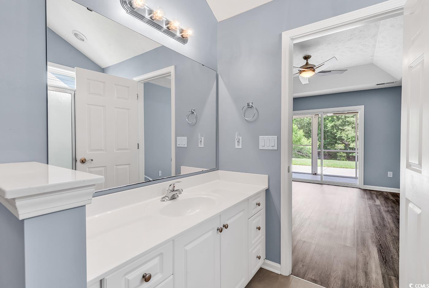 389 Barton Loop Myrtle Beach, SC 29579 - Photo 28 of 40 Bathroom with ceiling fan, vanity, baseboards, woo